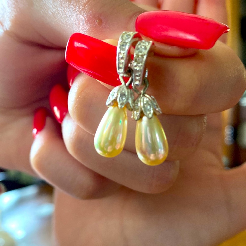 Pearl and rhinestone earrings.